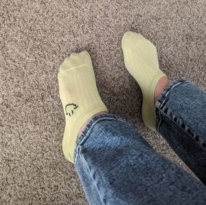 lime green worn no-show socks